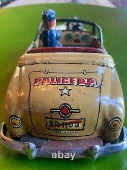 1950's Japanese Tin Police Dept. Car 8.5, in Very Good Condition