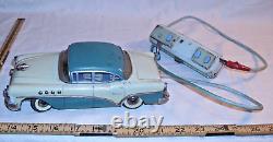1950s BUICK SPECIAL 4 DOOR HARD TOP CAR TIN BATTERY TOY JAPAN IN BLUE