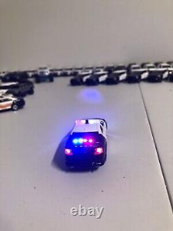 2013 FORD Taurus Black And White POLICE 1/64 With LED Lights Sold With Charger