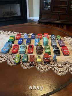 Disney Pixar CARS Mixed Lot of 28 Vehicles Metal & Plastic and wood Various Size