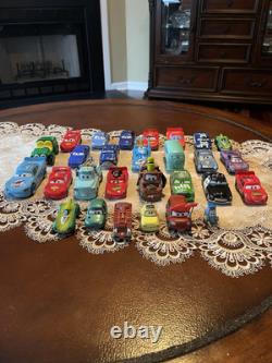 Disney Pixar CARS Mixed Lot of 28 Vehicles Metal & Plastic and wood Various Size