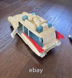 Ghostbusters Cars and Action Figures lot. Damaged and or missing parts