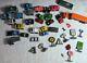 Micro Machines Lot Of 25 Vehicles From Galoob + Road Champs Allied Truck & Signs