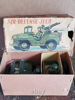 Nomura Japan Tin Litho Friction Air Defense Jeep U. S. Army Military Toy Car