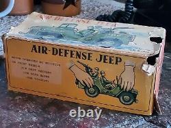 Nomura Japan Tin Litho Friction Air Defense Jeep U. S. Army Military Toy Car