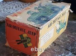 Nomura Japan Tin Litho Friction Air Defense Jeep U. S. Army Military Toy Car