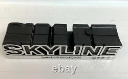 The Skyline Nissan Symbol of 25 Years of Quality Emblem figure Rare Japan Post