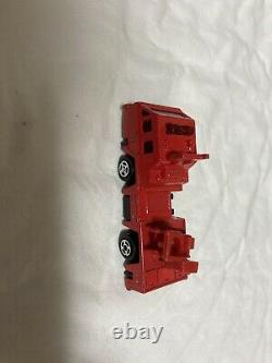 Toy minicar red fire engine ladder car without ladder emergency vehicle Showa