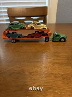 VINTAGE LARGE ARCADE CAST IRON CAR CARRIER / HAULER with 4 ARCADE VEHICLES