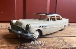 Vintage 1950s Buick Roadmaster Plastic & Tin Toy Friction Car With License Plate