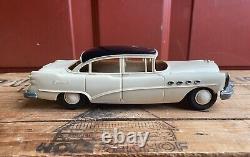 Vintage 1950s Buick Roadmaster Plastic & Tin Toy Friction Car With License Plate