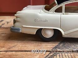 Vintage 1950s Buick Roadmaster Plastic & Tin Toy Friction Car With License Plate