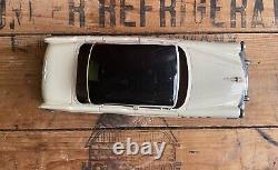 Vintage 1950s Buick Roadmaster Plastic & Tin Toy Friction Car With License Plate