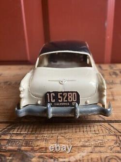 Vintage 1950s Buick Roadmaster Plastic & Tin Toy Friction Car With License Plate