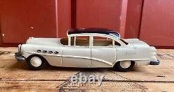 Vintage 1950s Buick Roadmaster Plastic & Tin Toy Friction Car With License Plate