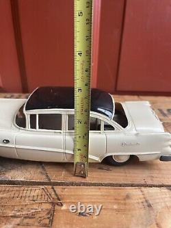 Vintage 1950s Buick Roadmaster Plastic & Tin Toy Friction Car With License Plate