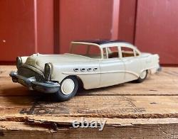 Vintage 1950s Buick Roadmaster Plastic & Tin Toy Friction Car With License Plate