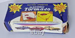 Vintage Japan Tin Battery Operated Oldsmobile Toronado Toy Car Works withBox Taiyo