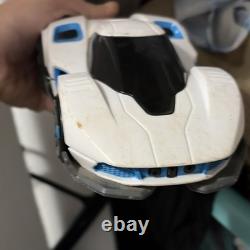 White & Blue Toy Car Vehicle with Black Windows, Battery Compartment on Bottom