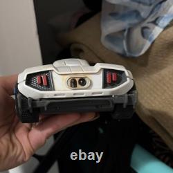 White & Blue Toy Car Vehicle with Black Windows, Battery Compartment on Bottom