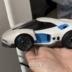White & Blue Toy Car Vehicle with Black Windows, Battery Compartment on Bottom