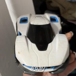 White & Blue Toy Car Vehicle with Black Windows, Battery Compartment on Bottom